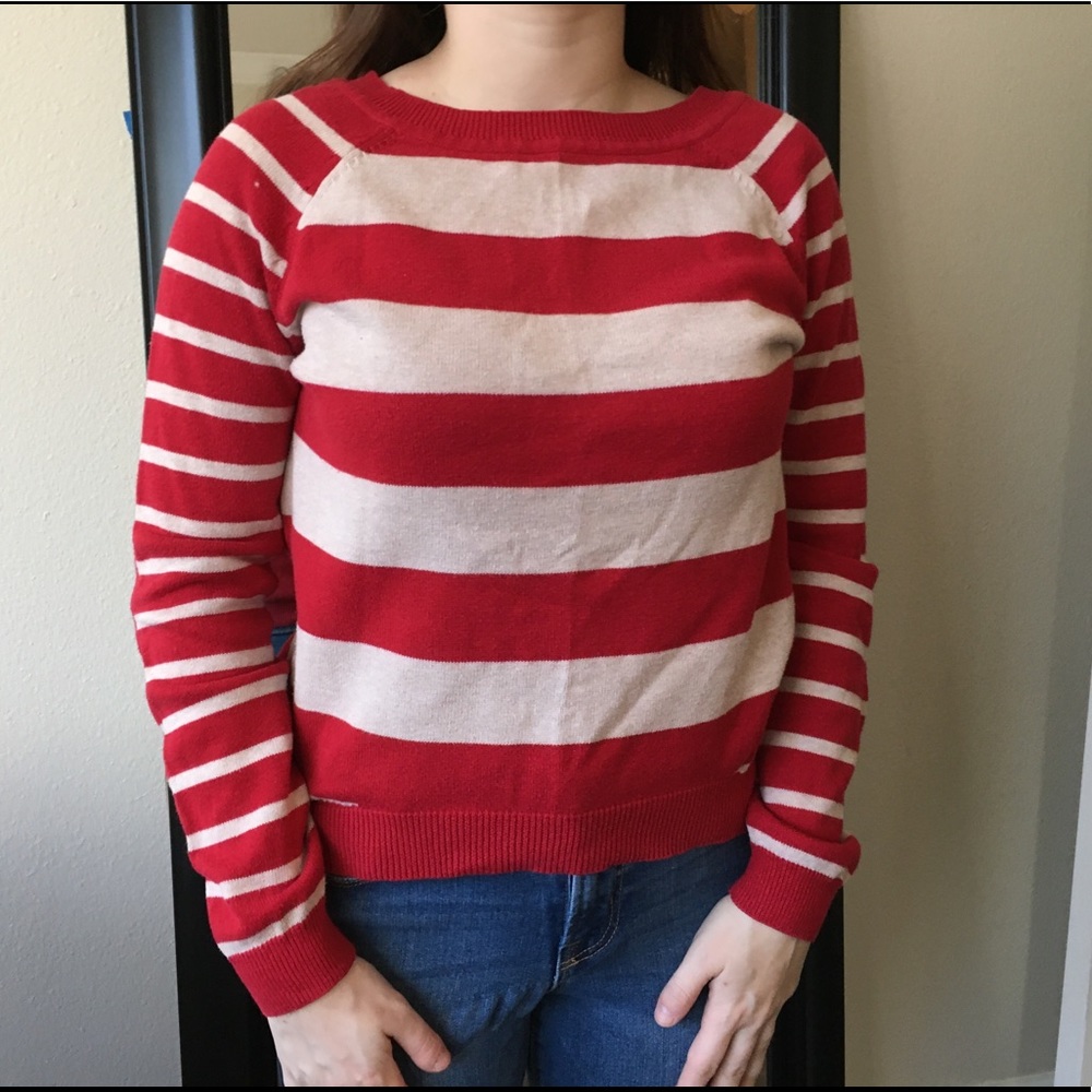 Red and cream colored sweater